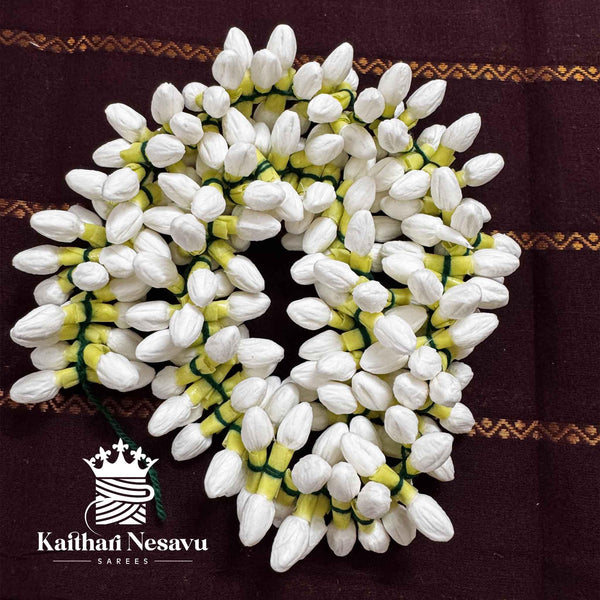 Long artificial jasmine garland with fresh-look buds for weddings and festivals.
