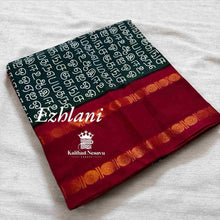 Purchase the Bottle Green Ezhilani Sungudi Cotton Saree featuring Tamil alphabet prints. Soft, breathable fabric, perfect for cultural events. Order now!