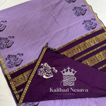 Handloom pink and purple saree with gold zari border and traditional peacock motifs