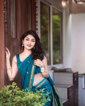 Teal Blue Handloom Saree in Premium Cotton with Gold Zari includes Running Blouse by Kaithari Nesavu.