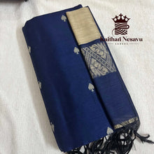 Navy blue handloom cotton saree with silver motifs and contrasting gold pallu detail