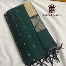 Handloom green cotton saree with gold pallu and black tassels, traditional weave