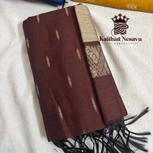 Handloom brown cotton saree with beige pallu and small woven motifs, elegant tassels
