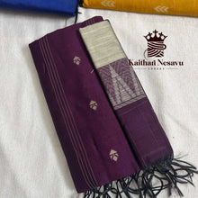 Handloom cotton saree in purple with zari border and motifs, displayed on white fabric