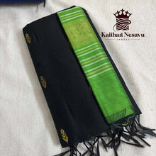 Black handloom saree with gold motifs and green zari pallu on a white background