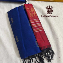 Handloom cotton saree with blue and red colors, gold motifs, and black tassels