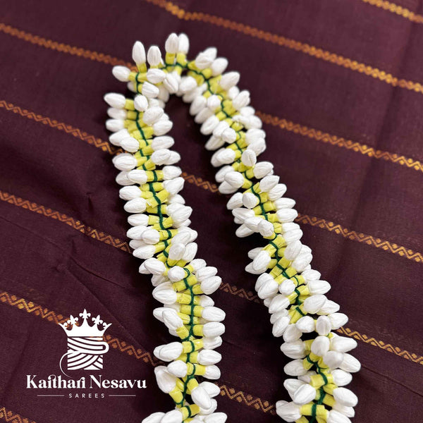 Handcrafted artificial jasmine flower string for bridal hair accessories.
