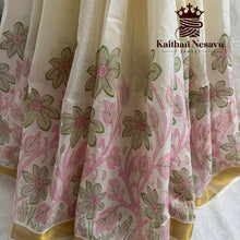Kerala cotton saree with pink floral and green leaf handloom pattern, gold border