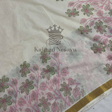 Kerala saree with floral print, green and pink flowers, gold zari border, handloom cotton