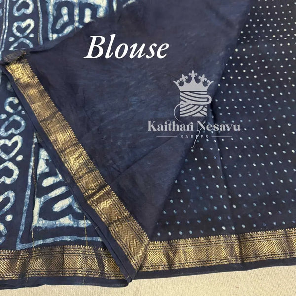 Navy blue handloom saree blouse fabric with gold zari border and dotted pattern