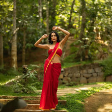 Red 120 count mul cotton saree with a vibrant yellow contrast border and elegant tassels – soft, breathable, and perfect for everyday grace. Available now at Kaithari Nesavu Sarees.
