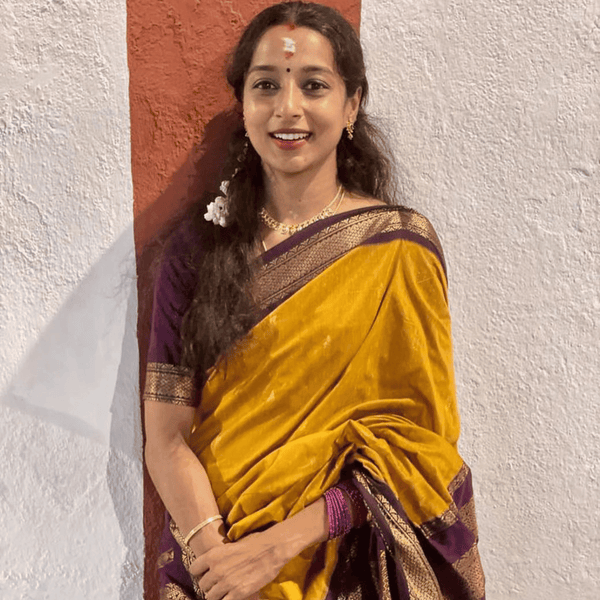 Sundari A Classic Beauty in Gold Zari Cotton Saree in yellow color and purple border