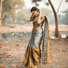 Elegant Tissue Silk Saree with a shimmering finish, perfect for weddings & festive celebrations. Shop online now!