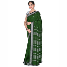 Pallu view of Green cotton saree with silver zari design