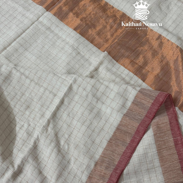 White checked linen saree with red pallu in copper zari – Onam traditional wear