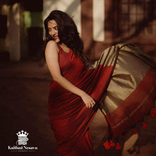 Mookuthi Amman inspired gicha silk saree in maroon wth gold by Kaithari Nesavu – traditional festive wear for divine styling.