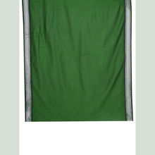 Green fabric with gray border on a light green background