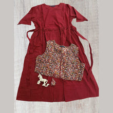 Close-up of maroon maternity dress with katha stitch design and feeding zip.