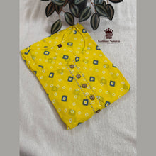 Close-up of Mustard Yellow maternity dress with feeding zip and rope tie