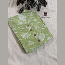 Close-up of Olive Green maternity dress with invisible feeding access